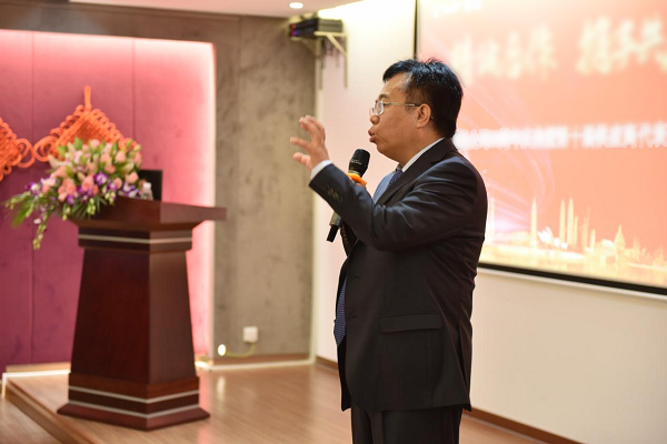 Jack Liang delivering a speech